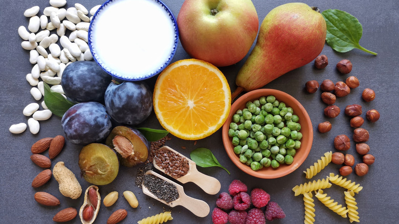 variety of fiber-rich foods on black table