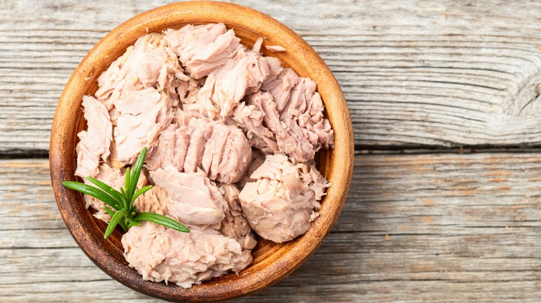 Drained canned tuna meat in a bowl