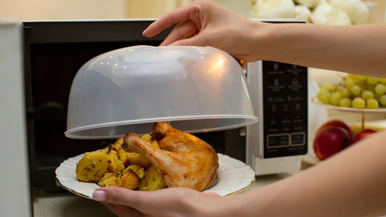 Microwaving a plate of chicken