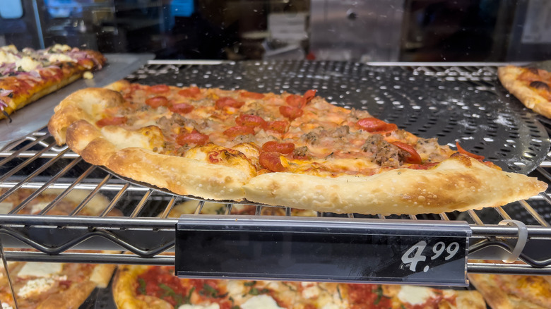 Close-up of pizza on wire rack