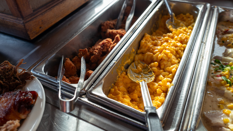 Creamed corn and fried chicken at buffet