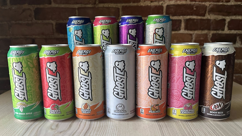 Ghost Energy drinks on wooden table