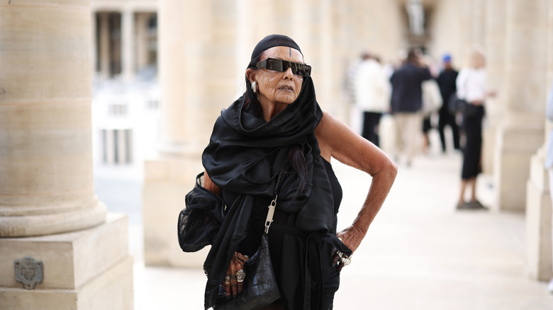 Michèle Lamy posing in sunglasses