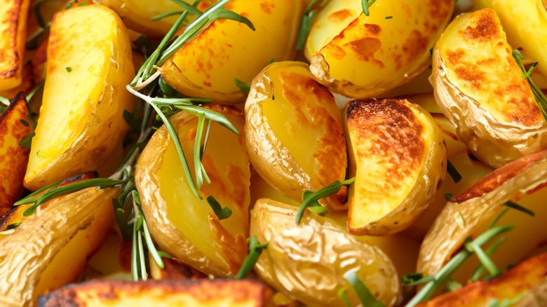 Cluster of oven roasted potatoes with arugula
