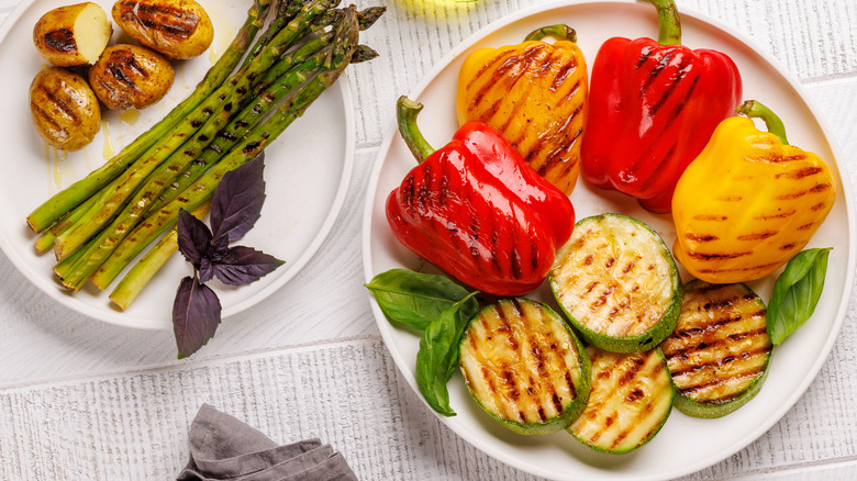 Platters of grilled vegetables and potatoes