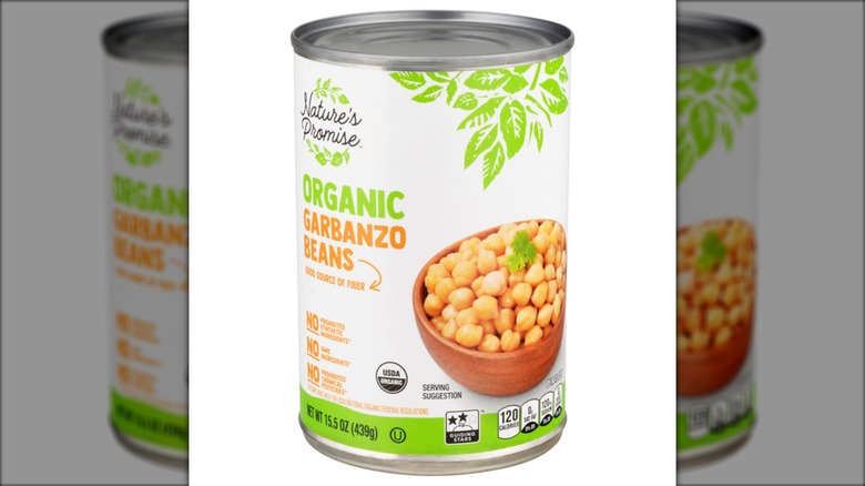 Can of Nature's Promise low sodium garbanzo beans on white background