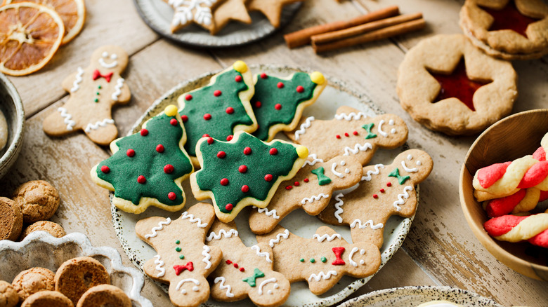 Plate of gingerbread people and tree-shaped cookies