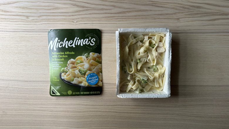 Michelina's Fettuccine Alfredo with Chicken and Broccoli on wooden table
