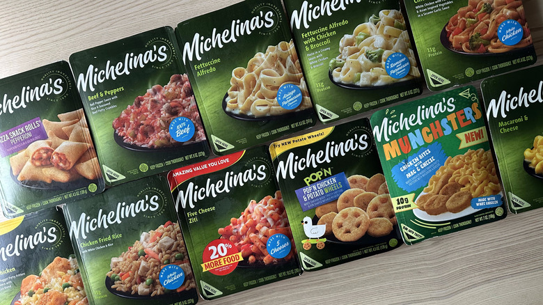 Michelina's frozen dinners arranged on wooden table