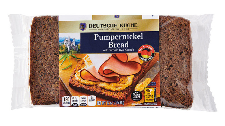 A loaf of pumpernickel bread still in its wrapper