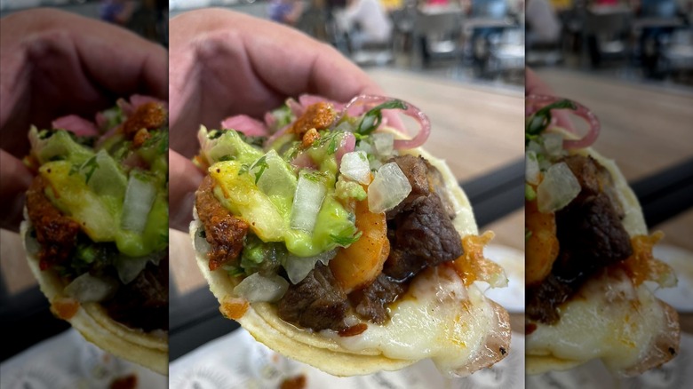 Meat taco with guacamole and toppings from Santo Taco in Utah