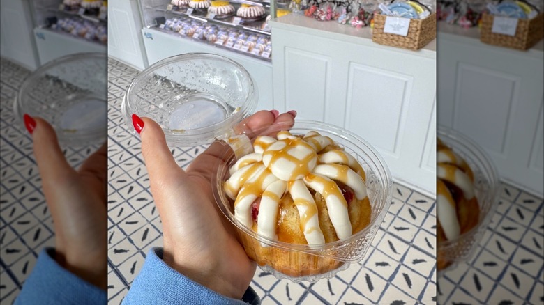 Hand holding a Pineapple Upside Down bundlet