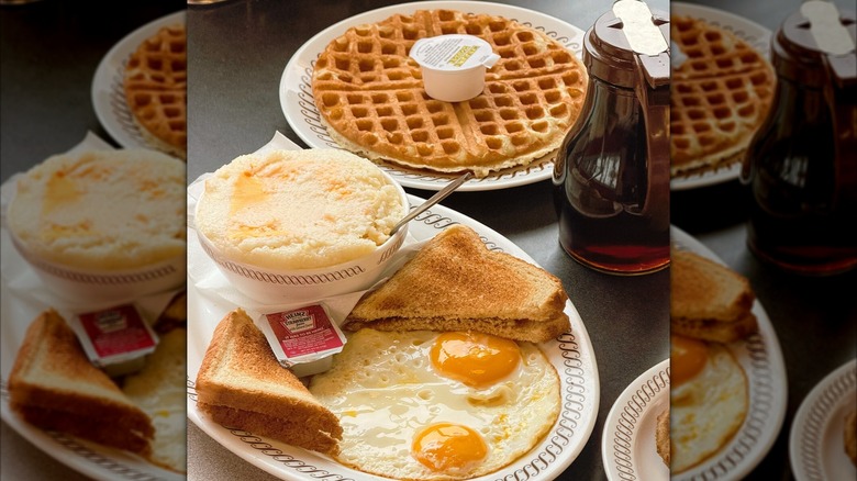 Plates at Waffle House with toast, eggs, waffles, and syrup.