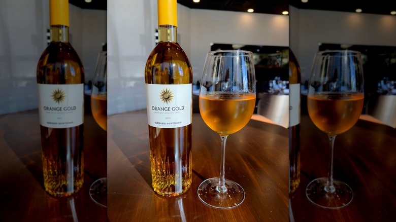 bottle and glass of orange wine