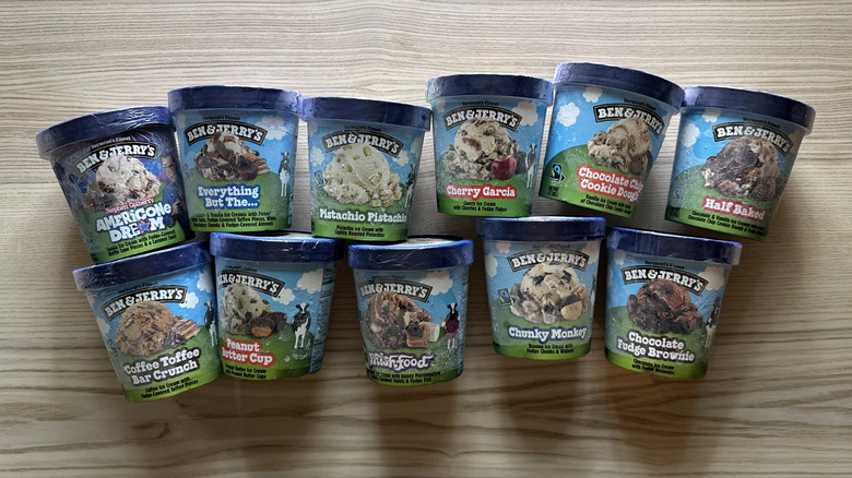 Pints of Ben and Jerry's ice cream on wooden table