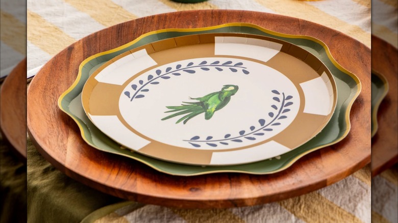 The Table Two Studio Cabana Appetizer Plate resting on a charger plate