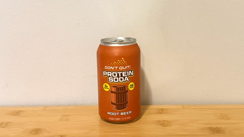 Don't Quit!: Root Beer protein soda can on display