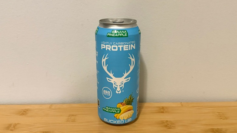 Bucked Up: Banana Pineapple protein soda can on display