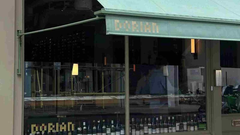 Exterior shot of the green awning at Dorian in London