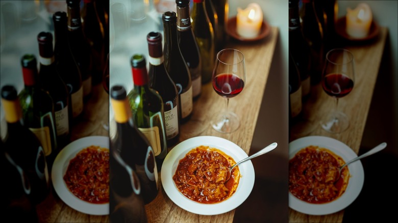 Tripe dish with several bottles of wine at Mountain