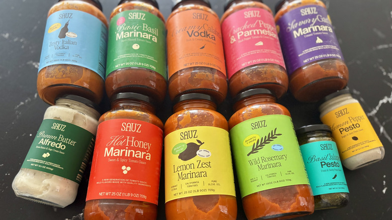 Various Sauz jarred pasta sauces on countertop