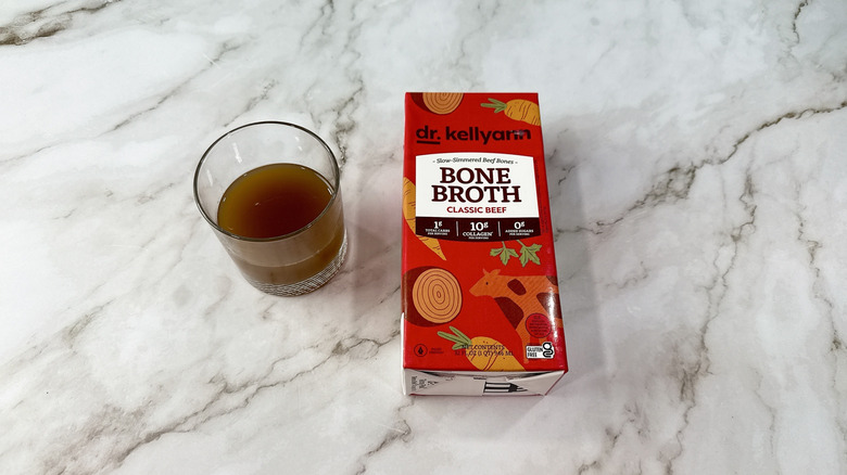 Dr. Kellyann bone broth and glass of broth