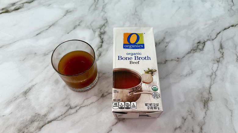 O Organics beef bone broth and glass of broth