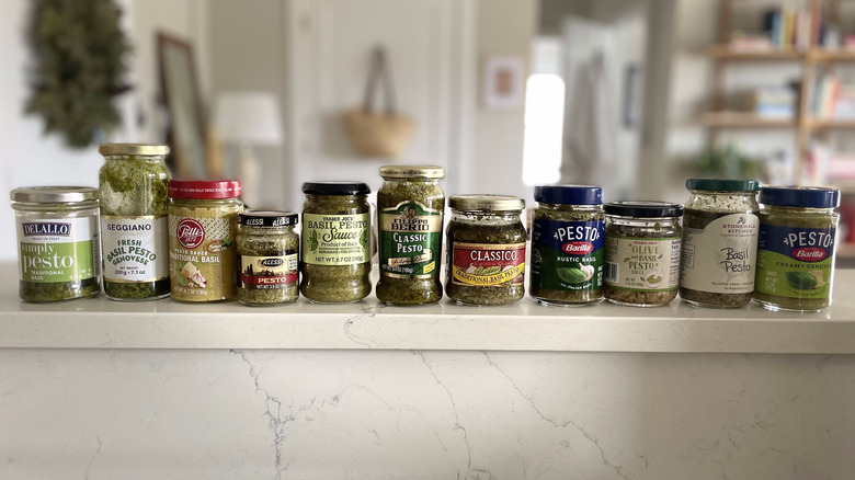 pesto jars lined up on counter