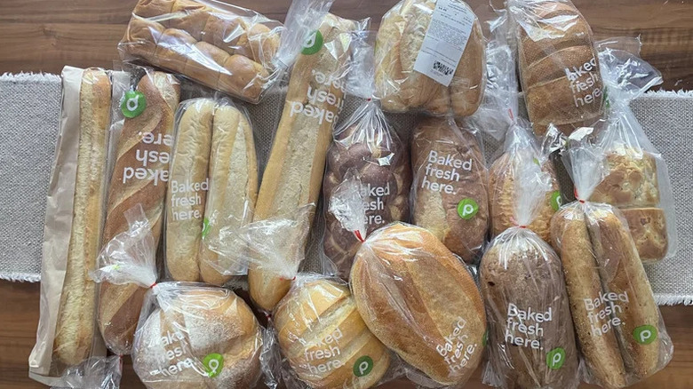 Variety of Trader Joe's bread on wooden table