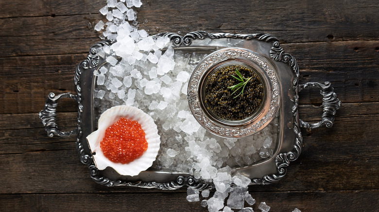 Red and black caviar on a tray