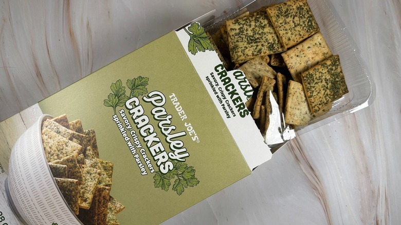 Trader Joe's Parsley Crackers and box on marbled surface