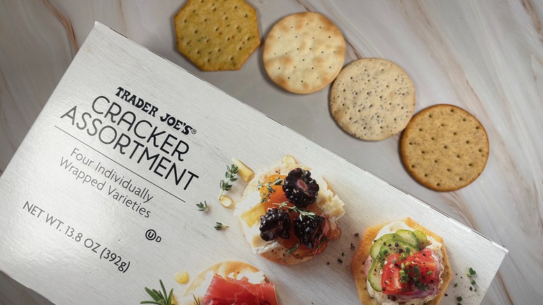 Trader Joe's Cracker Assortment crackers and box on marbled surface