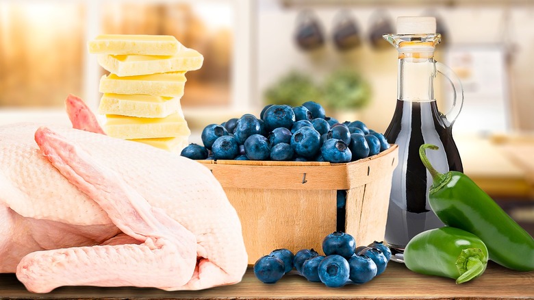blueberries, duck, cheese, wine bottle