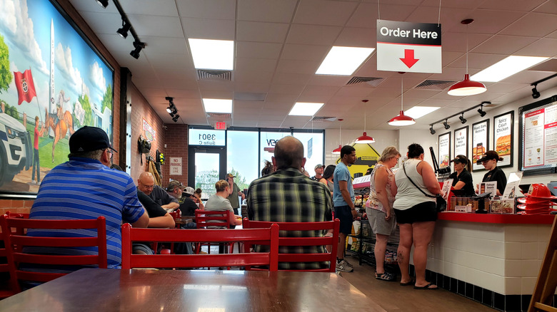 Firehouse Subs line inside the shop