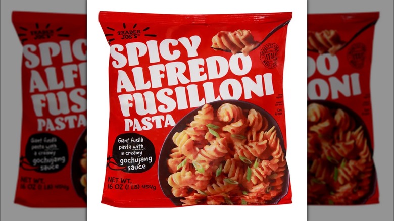 Red bag of Spicy Alfredo Fusilloni pasta on white background