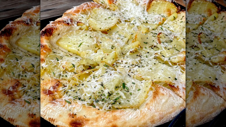 A potato pizza with sourdough crust