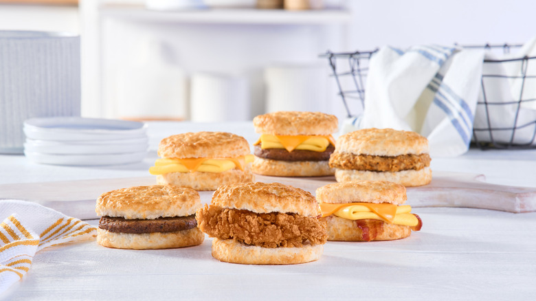 Several breakfast biscuits from Bojangles on a table