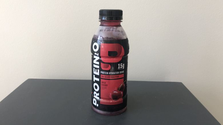 A bottle of Aldi Protein20 wild cherry protein hydration drink