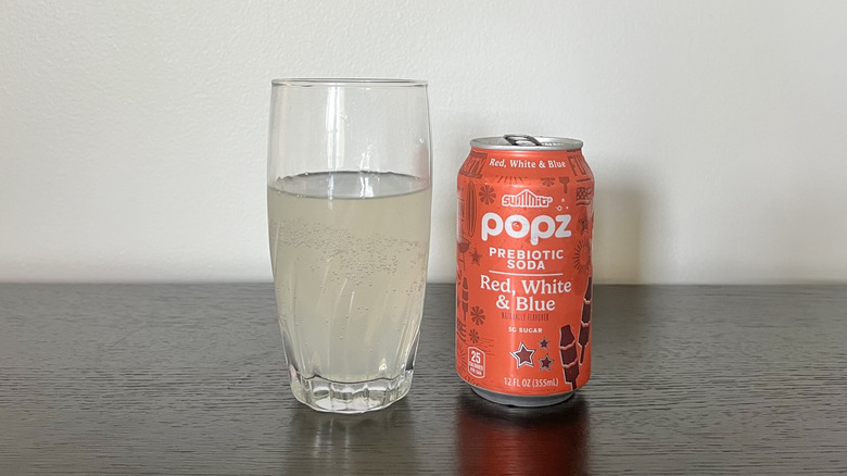 Summit Popz Red, White & Blue soda in a glass.
