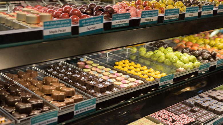 A variety of colorful and creative confections at a public market.
