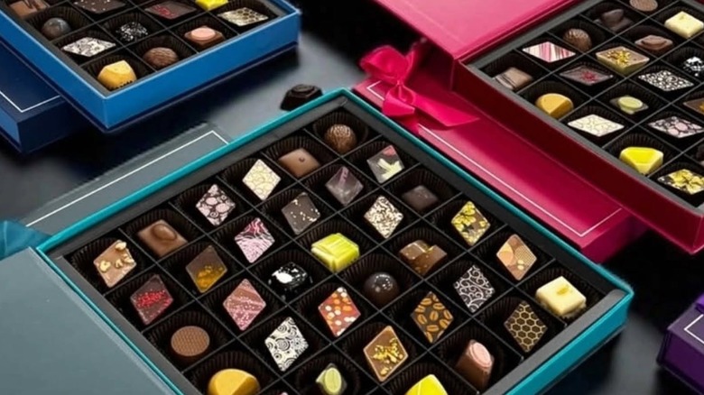 Opened boxes showcasing assorted chocolate bonbons