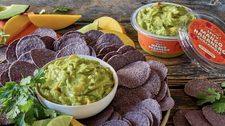 Trader Joe's Mango Habanero Guacamole in a bowl surrounded by chips