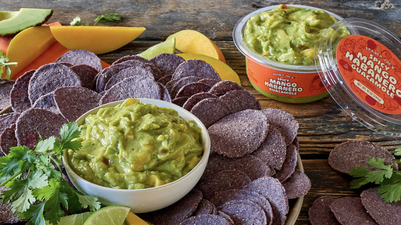 Trader Joe's Mango Habanero Guacamole in a bowl surrounded by chips