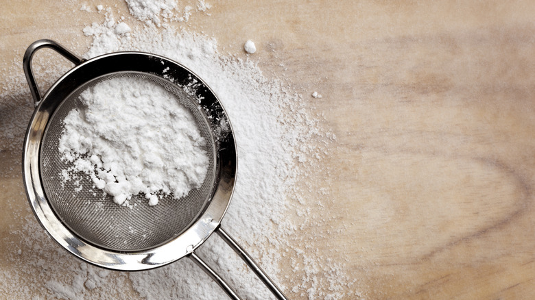 Powdered sugar in sifter