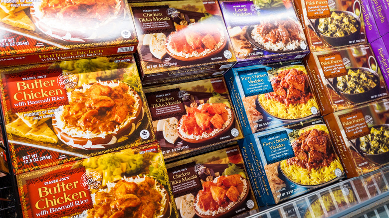 Frozen Indian entree selection at Trader Joe's, including chicken, lamb, and paneer options