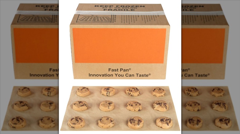 Box of Member's Mark Fast Pan chocolate chunk cookies and frozen cookies on brown paper