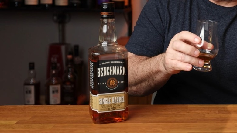 A bottle of Benchmark Single Barrel whiskey