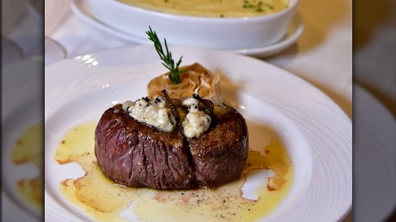 The Palm Restaurant filet mignon on white plate