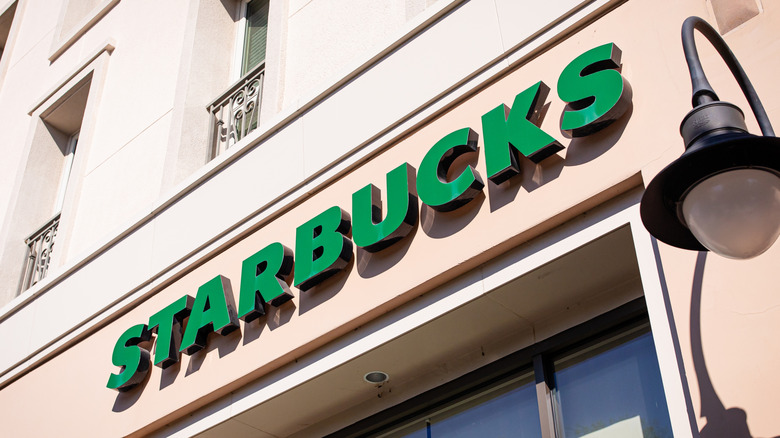 Starbucks sign on beige building