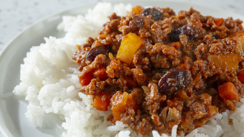 Meat picadillo over rice with raisins